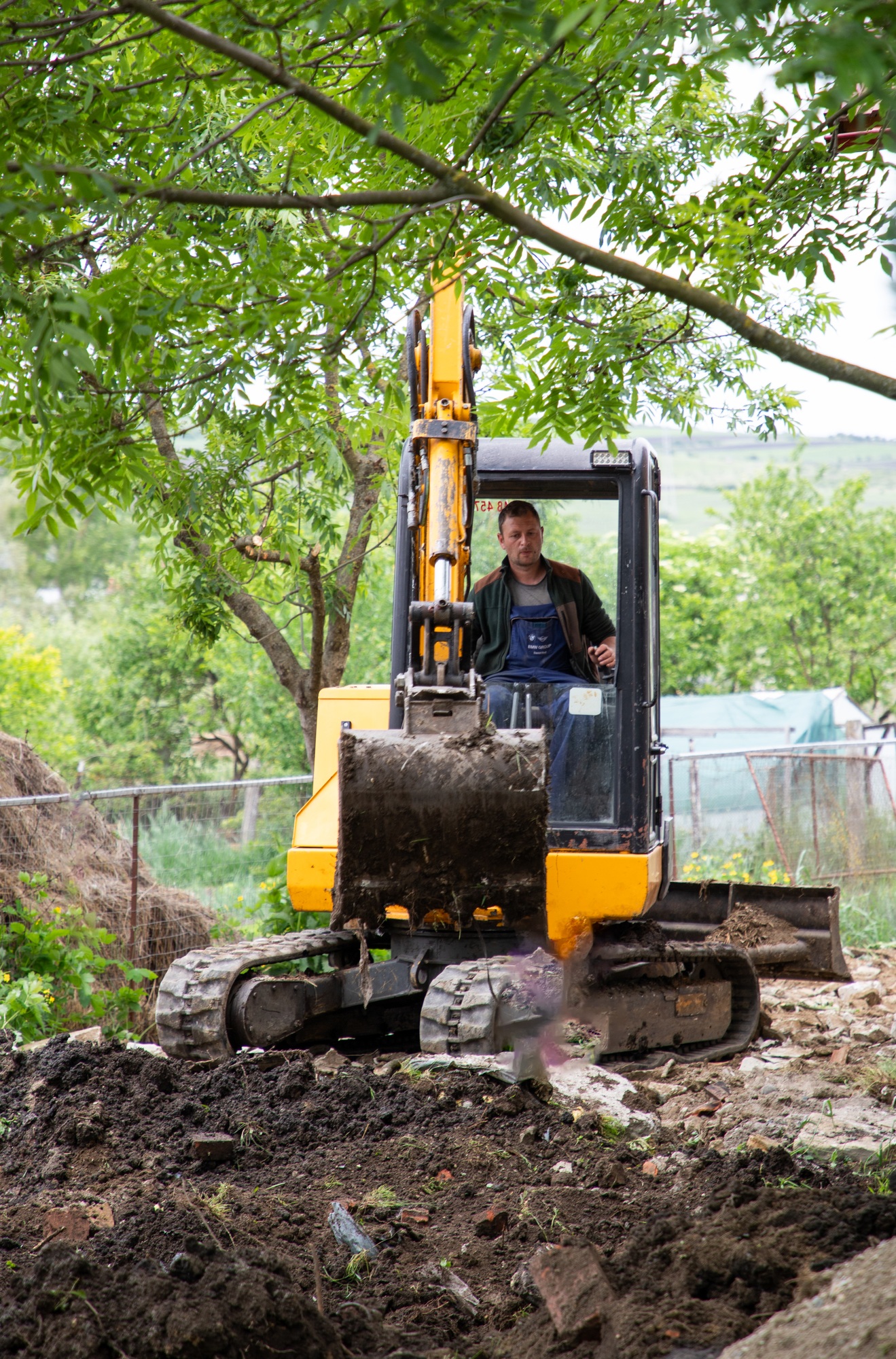 excavator with Bucket lift up are digging the soil in the construction site on